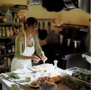 Lisa Copeland cooks in the kitchen