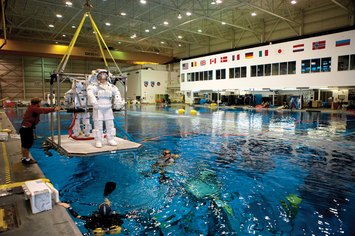 While it's impossible on Earth to experience the zero-gravity challenges of space, astronauts can get pretty close in the 6.2 million-gallon pool known as the Neutral Buoyancy Lab, the centerpiece of NASA's Sonny Carter Training Facility. (Photo by Kirk Weddle)
