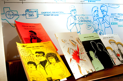 Hand-decorated script covers from the long-running King of the Hill animated series number among the Witliff's treasures. (Photo by Kevin Stillman)