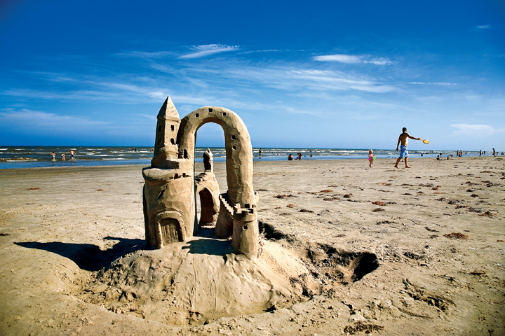 Signs of life on the beach: The sandcastle offers an opportunity to design, sculpt, and free-associate simul­taneously and in three dimensions. But never leave your sandcastle unattended; its life expectancy will be short (Photo by E. Dan Klepper).