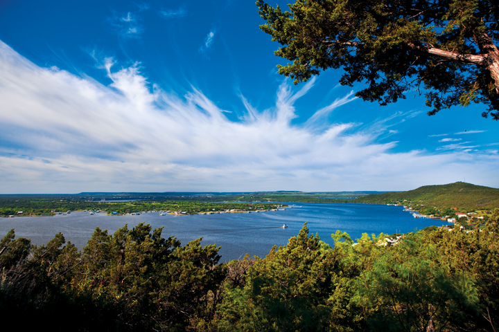 Cliff-top panoramas of Possum Kingdom Lake—such as this vista from the Angel View scenic lookout—reward trekkers on the Brazos River Authority’s 16 miles of hike-and-bike trails. (Photo by Kenny Braun)
