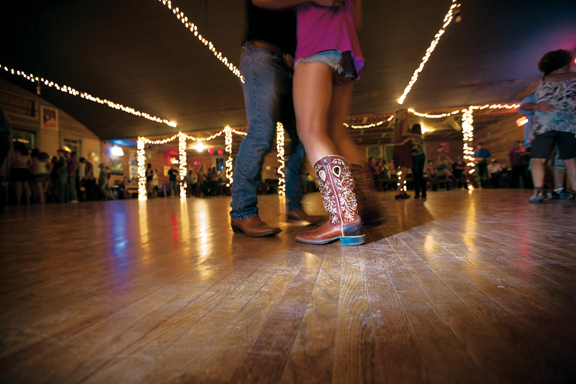 For some 140 years, Twin Sisters Dance Hall near Blanco has hosted first-Saturday dances. You don't need to be a Twin Sisters Hall Club member to scoot your boots here. (Photo by J. Griffis Smith)