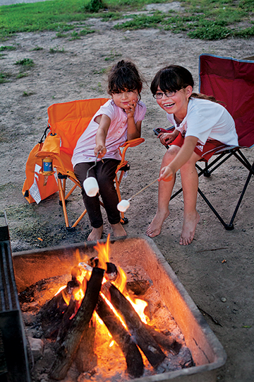 Roasted marshmallows make a fine dessert—or snack at any time of day—during a campout at Garner State Park. 