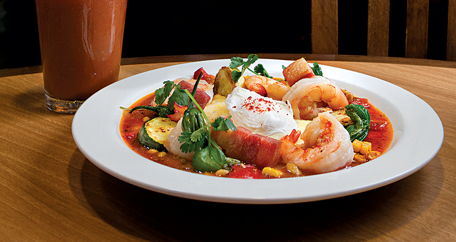 The brunch menu at Megg's Cafe includes specialties such as shrimp and grits, a Southern classic jazzed up with shishito peppers, crispy pork belly and a poached egg.