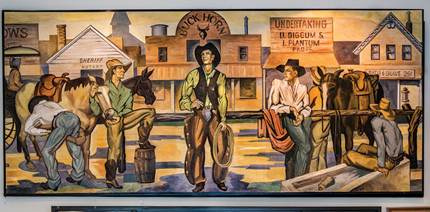 The Wimberley Community Center displays portions of Winn’s 1950 mural The History of Ranching, including the section above. 