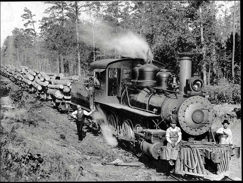 341-sitting-on-cow-catcher-log-train-1907