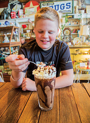 A milk shake called the “Old 400” honors the legacy of pharmacist  Tubby Wilson, who served a  similar ice-cream concoction in this building more than a century ago. 