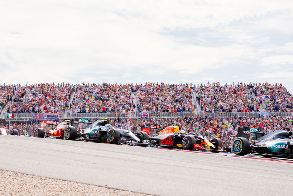 Drivers coming out of turn 1 on the first lap of the 2016 F1 United States Grand Prix.