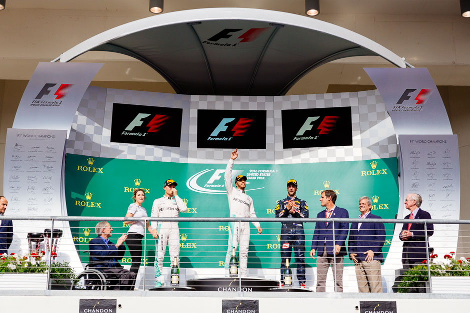 Podium ceremony. Lewis Hamilton placed first, Nico Rosberg placed second, and Daniel Ricciardo placed third.
