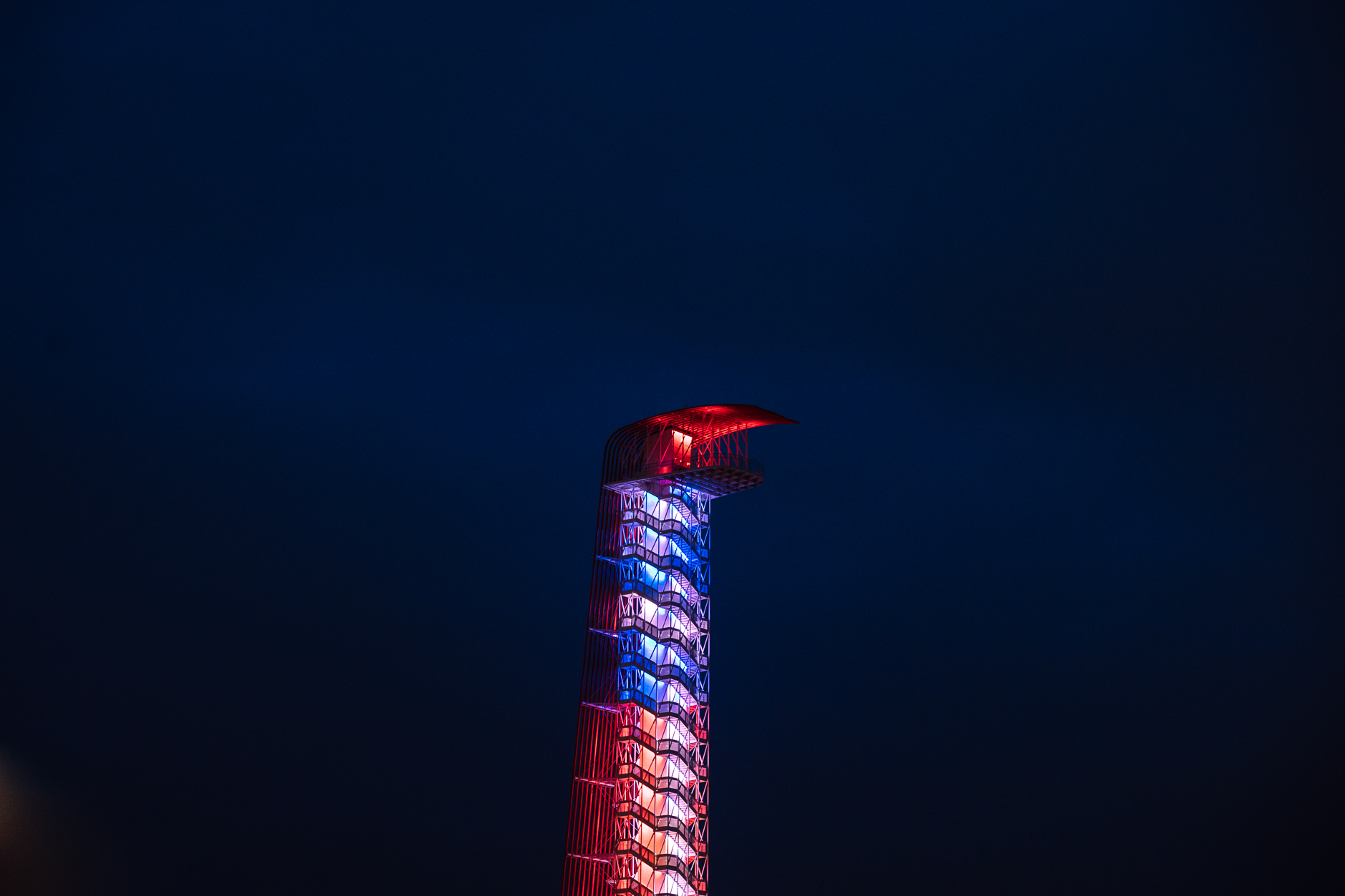 The Circuit of the Americas tower lit up in the pre-dawn hours Friday morning.