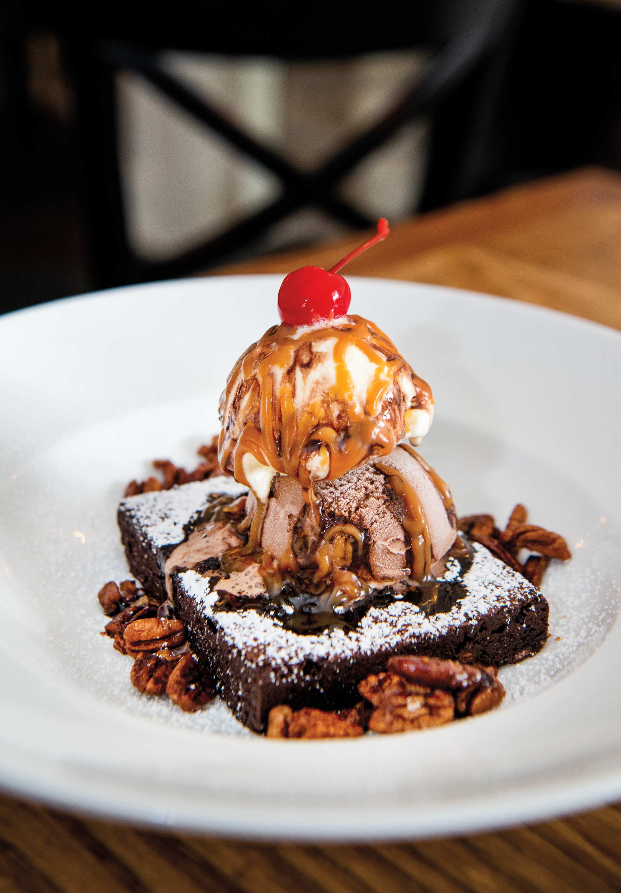 A brownie sits on a plate