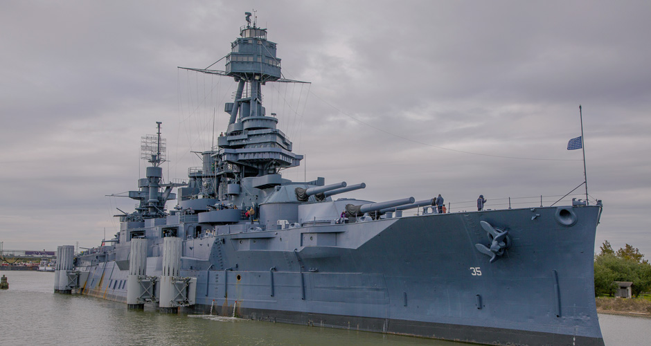 The Battleship Texas resting in the waters of Buffalo Bayou