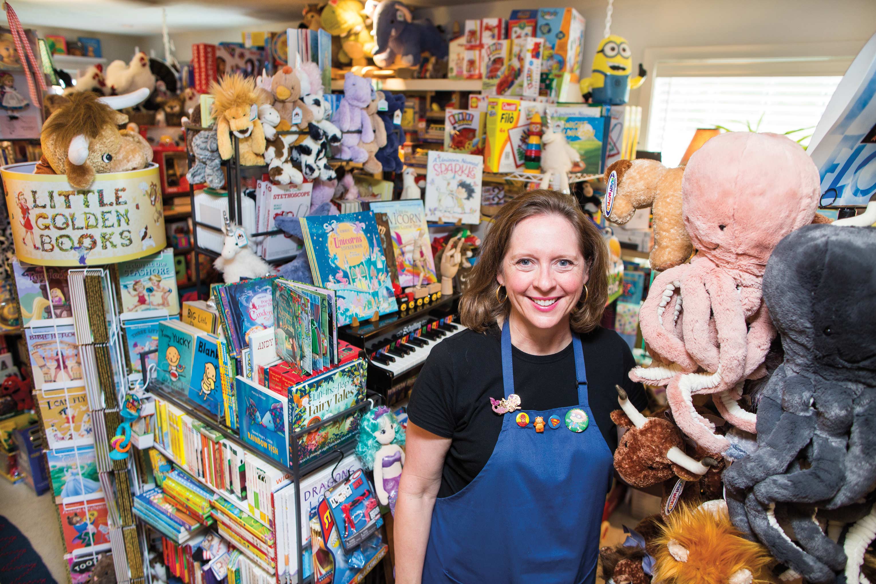 Betsy Barnhill Newman stands in Barnhill House Toys and Books