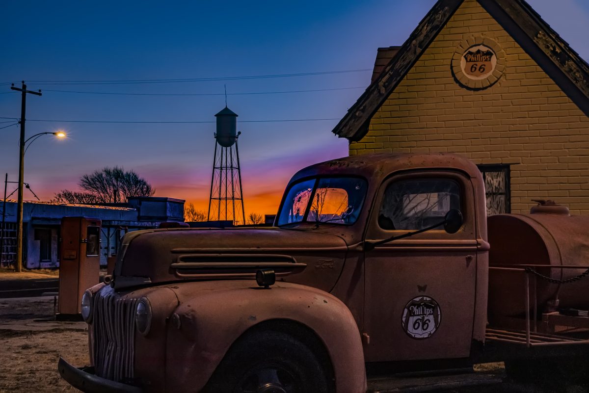 The sun sets behind the I Am Route 66 Museum & Gallery in Amarillo Texas