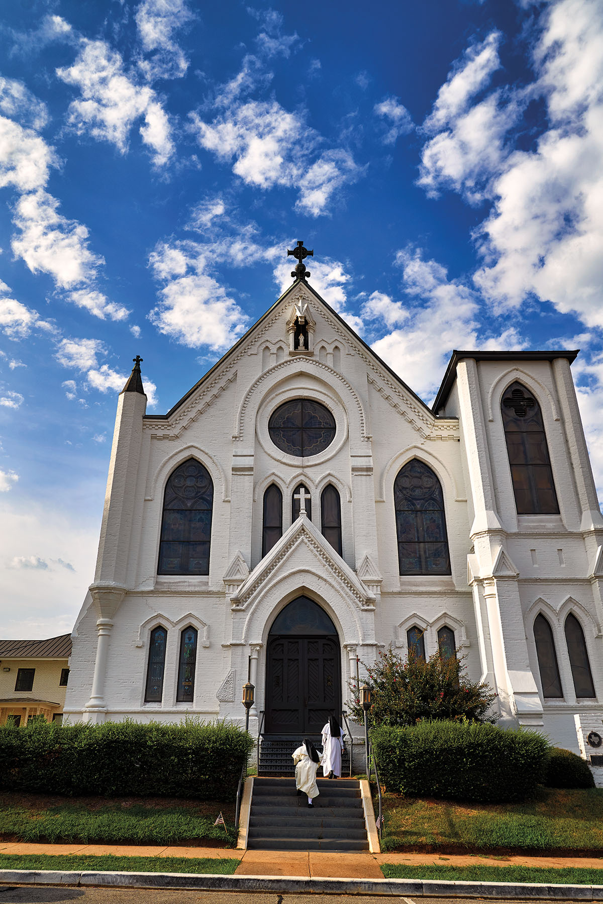 Nuns on the steps of Sacred Heart Catholic Church in Palestine, TX