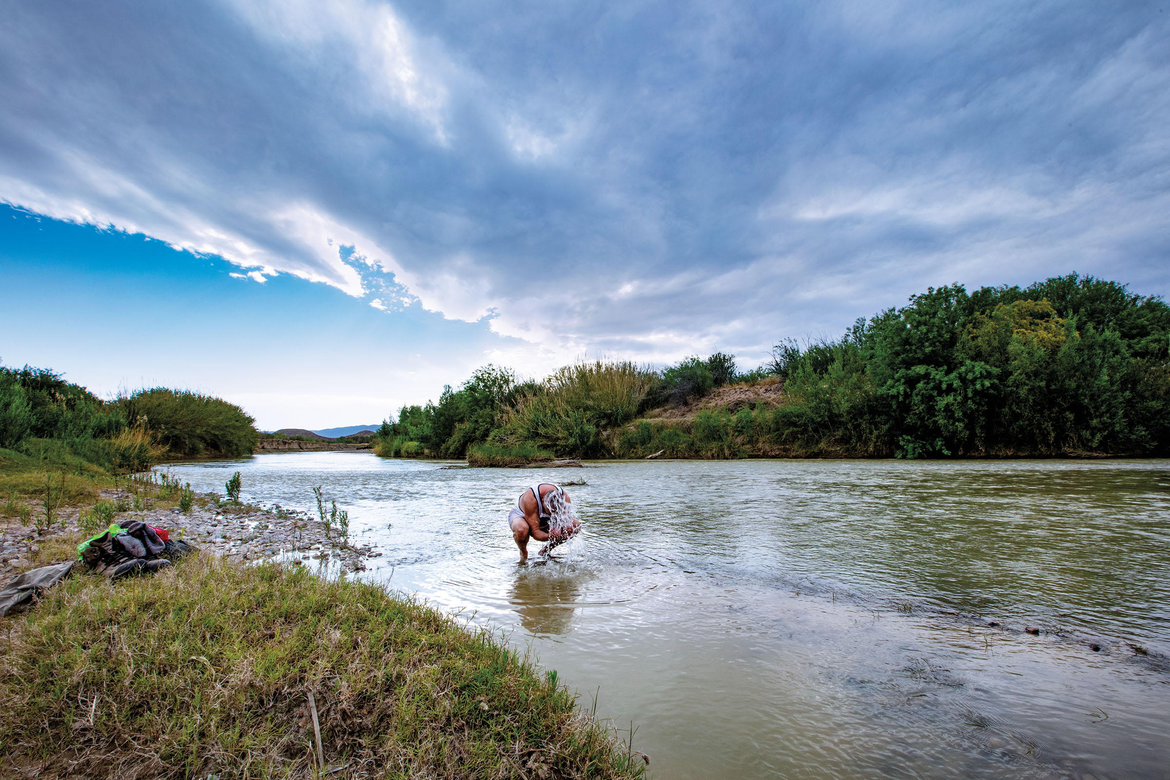 Photographer E. Dan Klepper cools off in the Rio Grande below Loop Camp