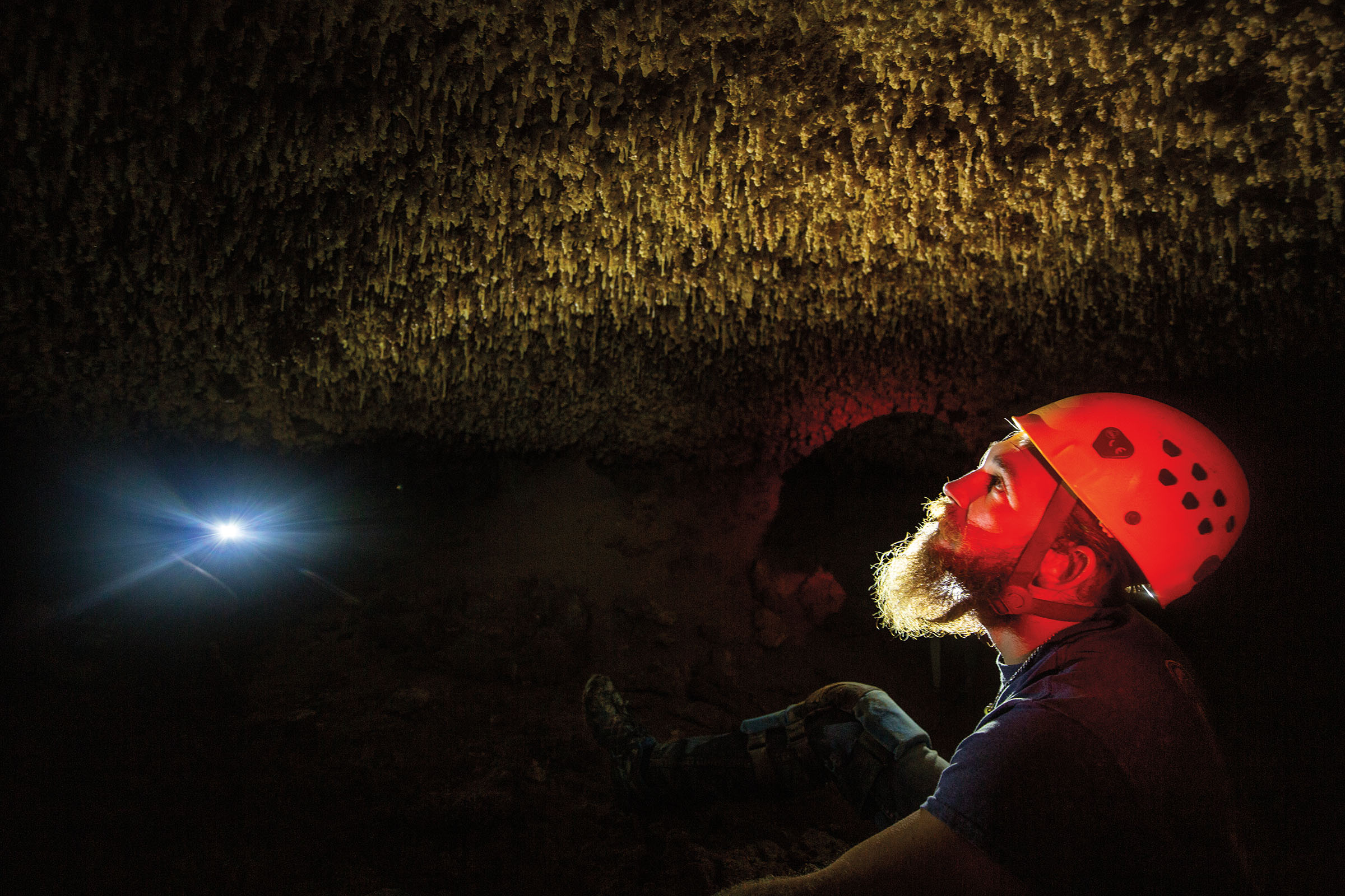 Colton Moore eyes speleothems in the Caverns of Sonora