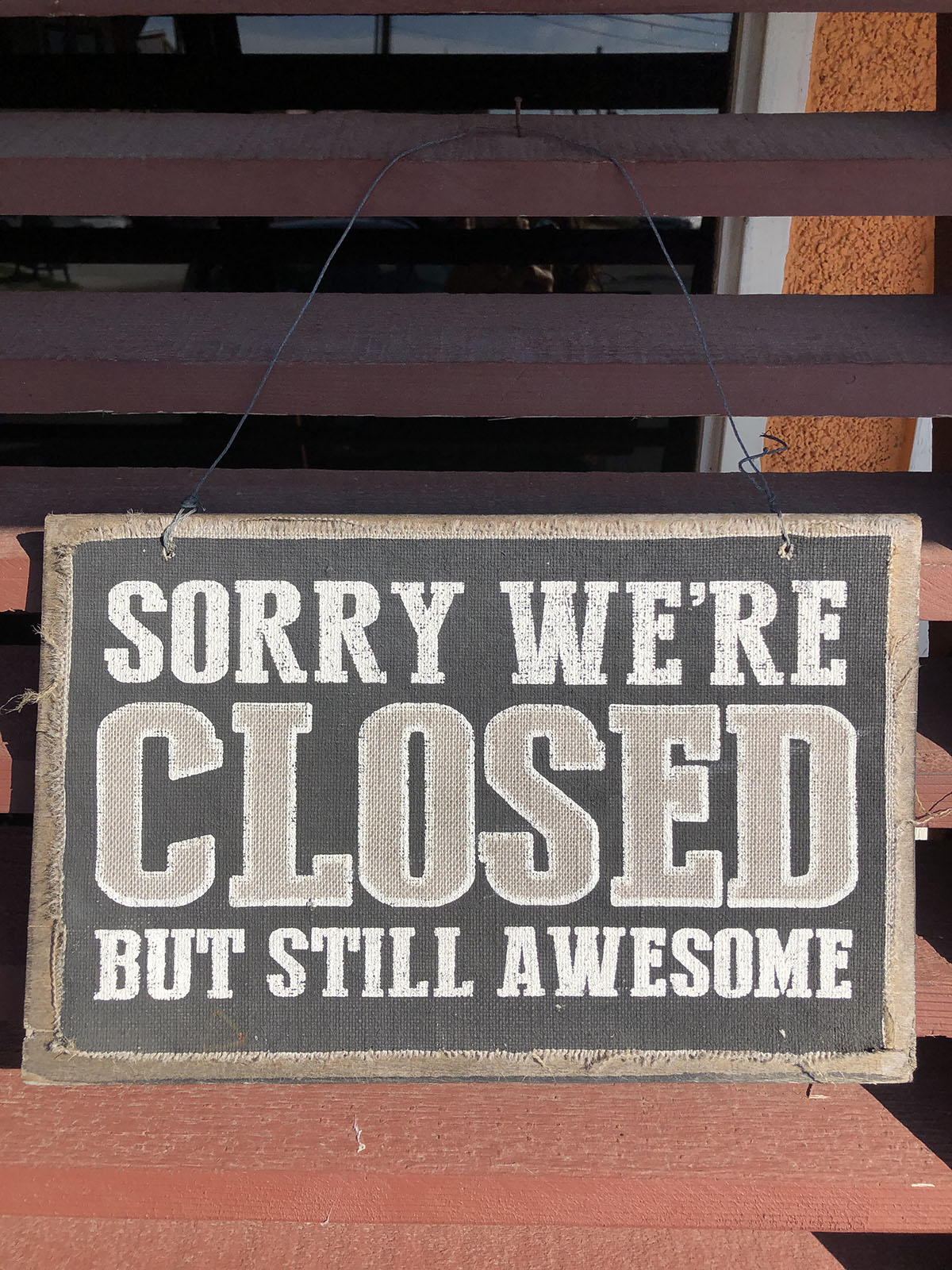 A sign reading "Sorry, We're Closed" outside Venetian Hot Plate