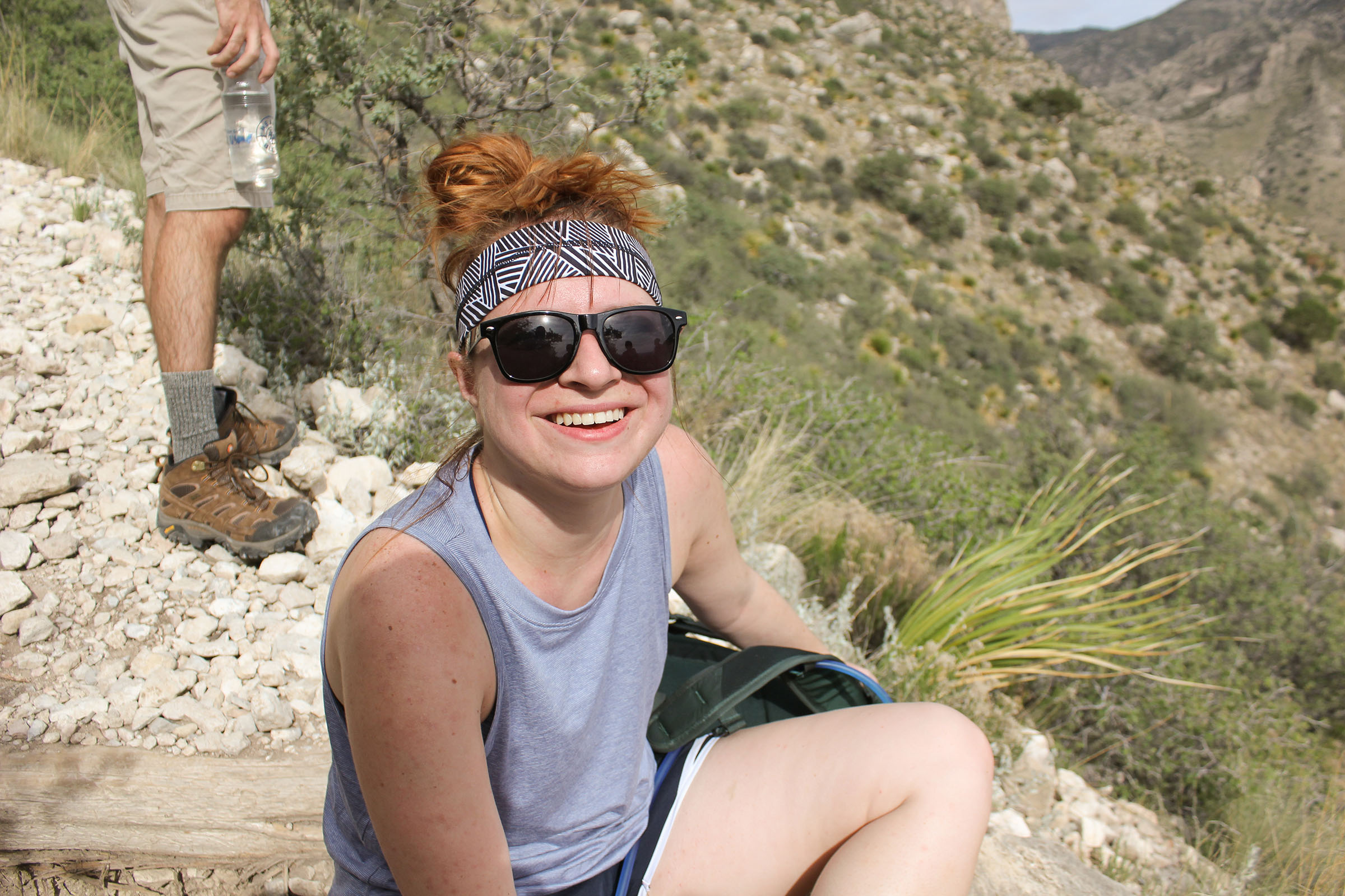 Texas Highways staffer Natalie Moore rests during her hike up Guadalupe Peak