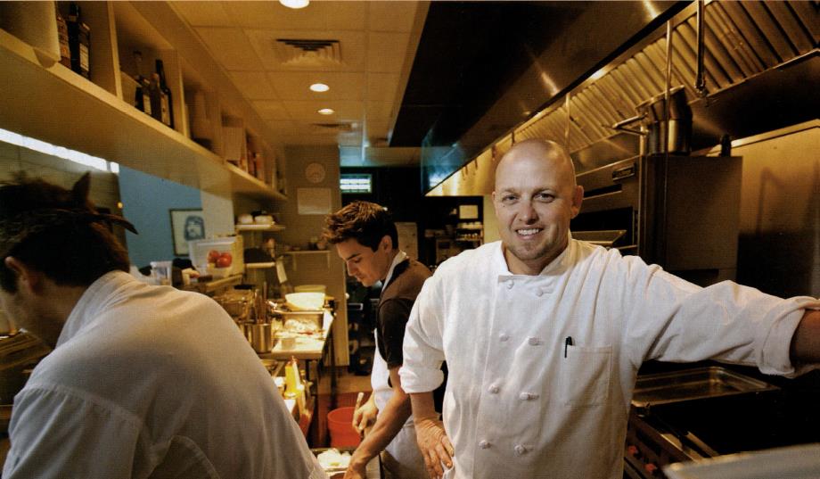 Chef James Holmes of Austin's Olivia poses in the kitchen