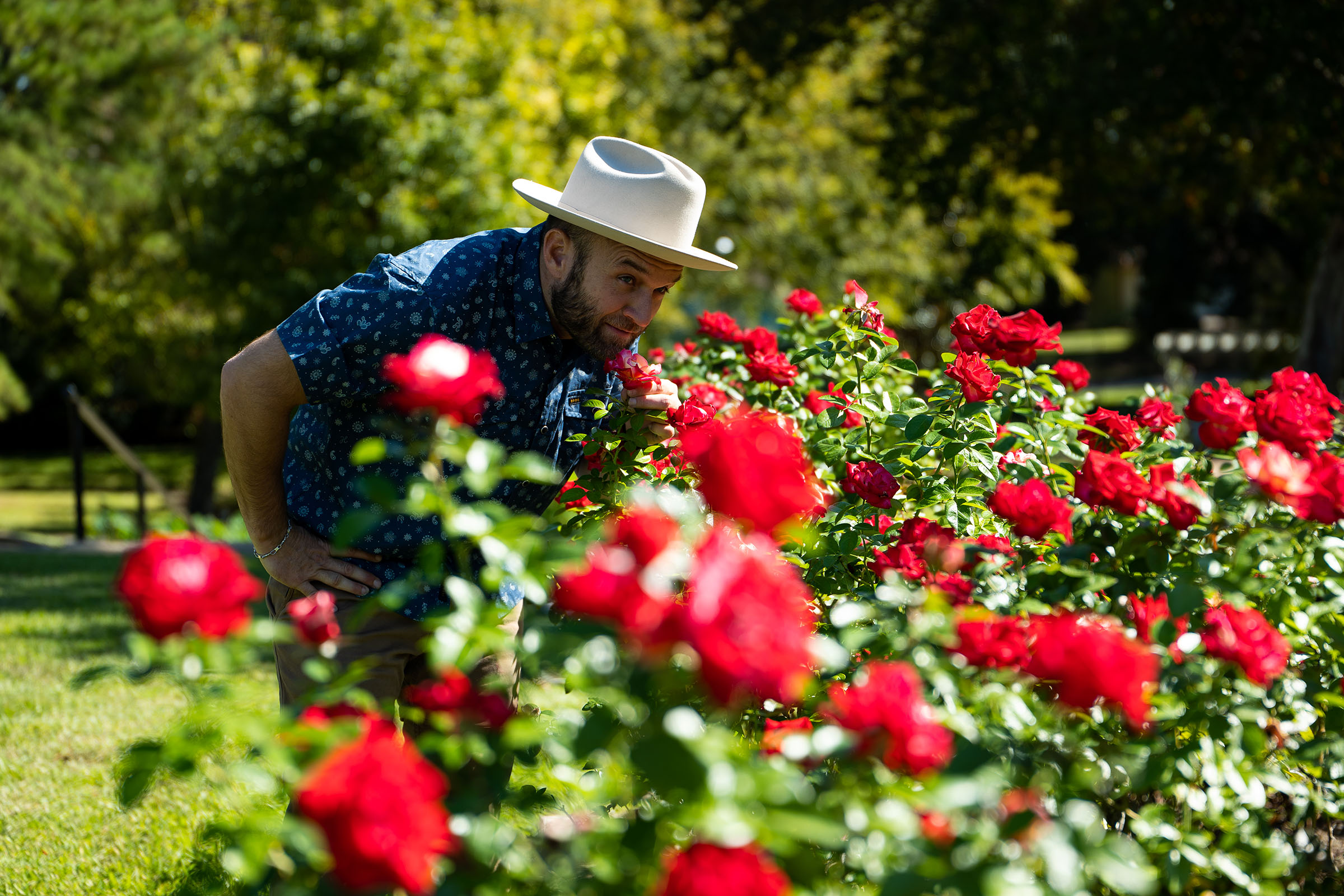 The Daytripper, Chet Garner, stops to smell the roses in Tyler Texas