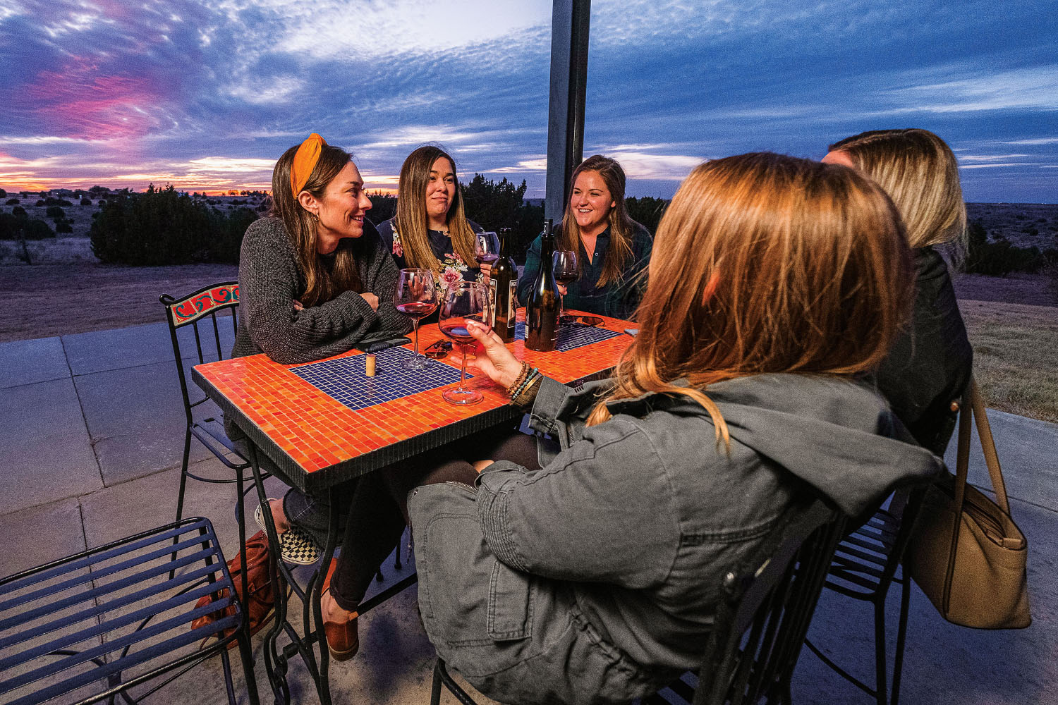 Five women sit at Bar Z Winery in Canyon Texas