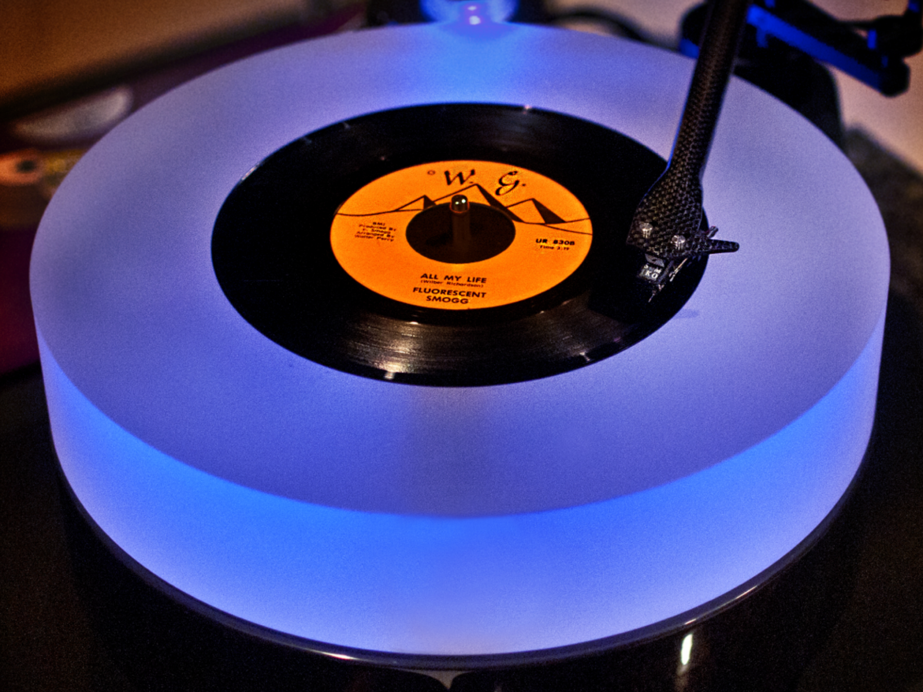 A Fluorescent Smogg record on a stereo-specific transfer turntable