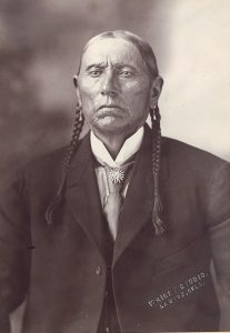 Quanah Parker poses in a black and white photo