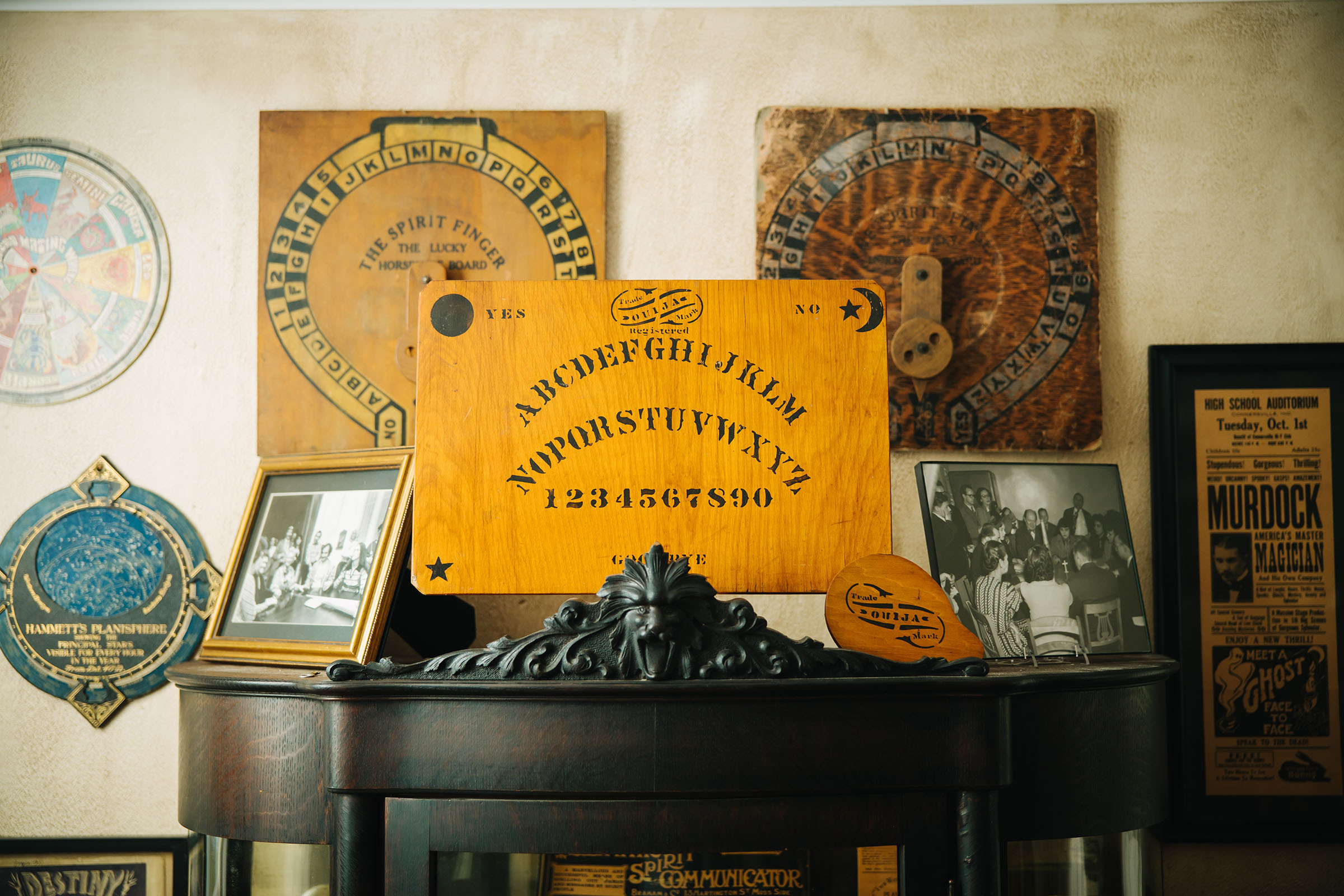 Ouija boards are one of the many items of spirituality displayed in the Mysterious Planchette House. 