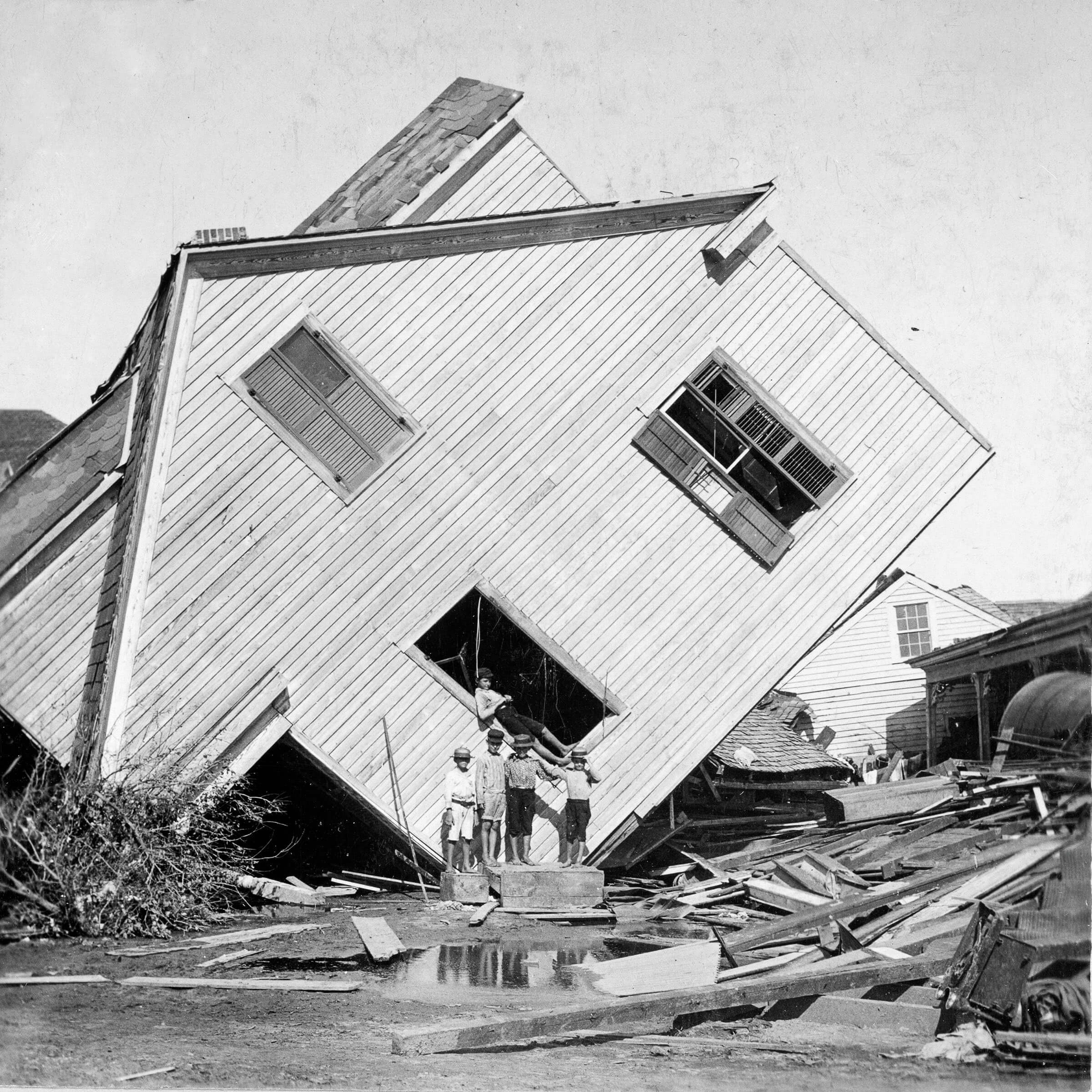 A house turned to its side during a hurricane