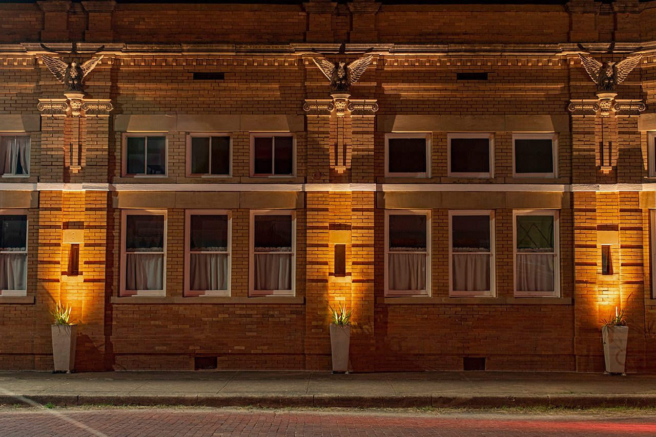 Photo of brick building at night