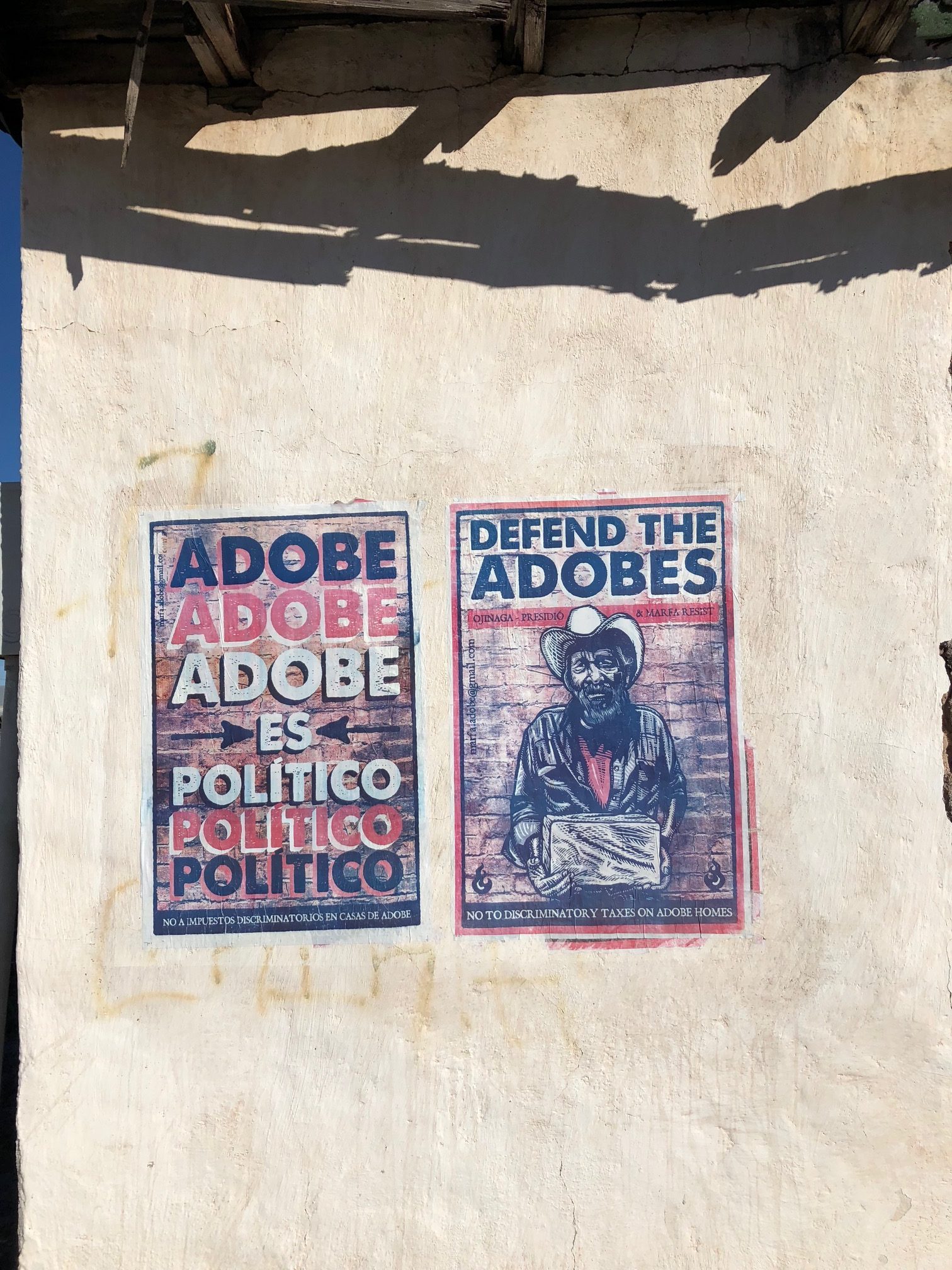 Photo of posters about adobe houses