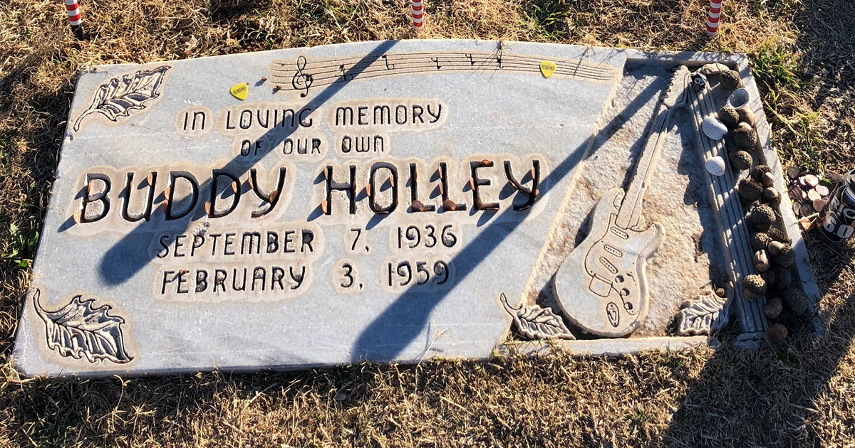 Photo of grave marker with the words Buddy Holley on it
