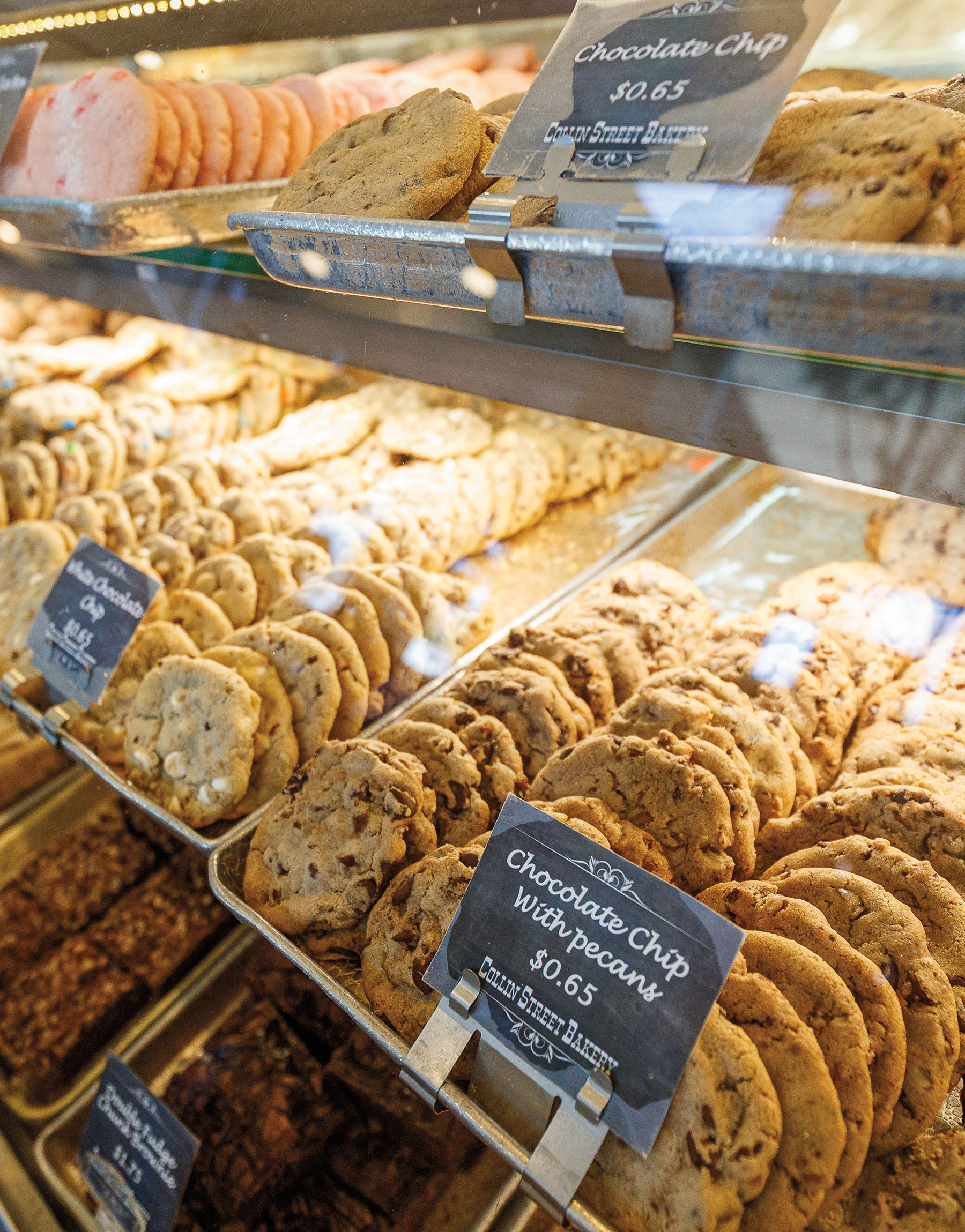 Cookies inside of a display case at Collin Street Bakery