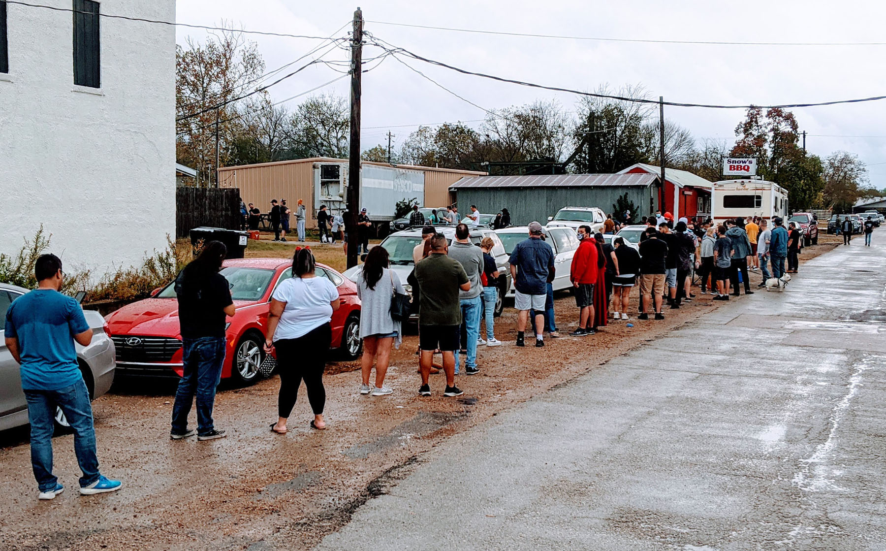 The line of hungry barbecue fans at Snow's BBQ reopening.