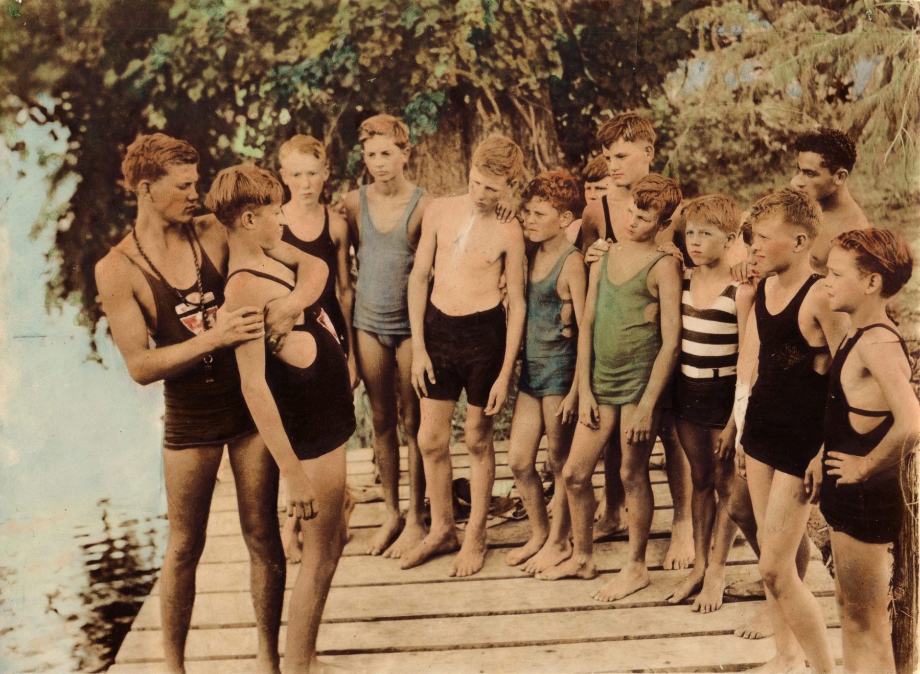 Color photo of boys in swimsuits