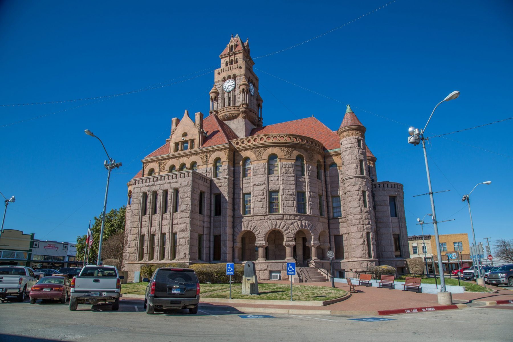 The Wise County Courthouse in Decatur sits under a blue sky. Photo by Will van Overbeek.