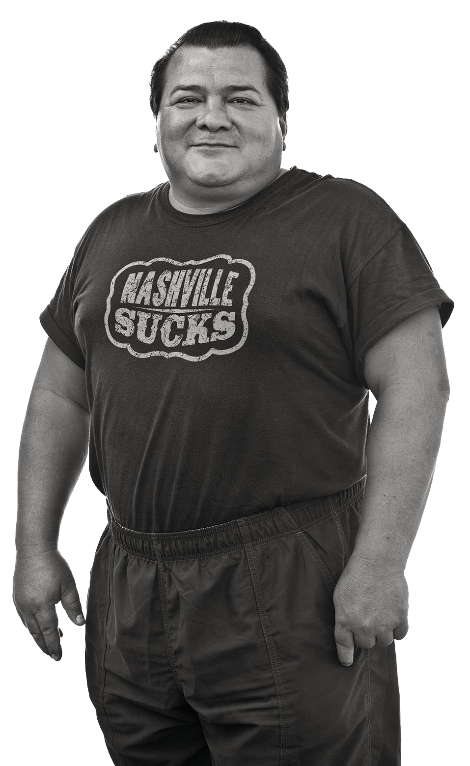 A man in a shirt reading 'Nashville Sucks' poses