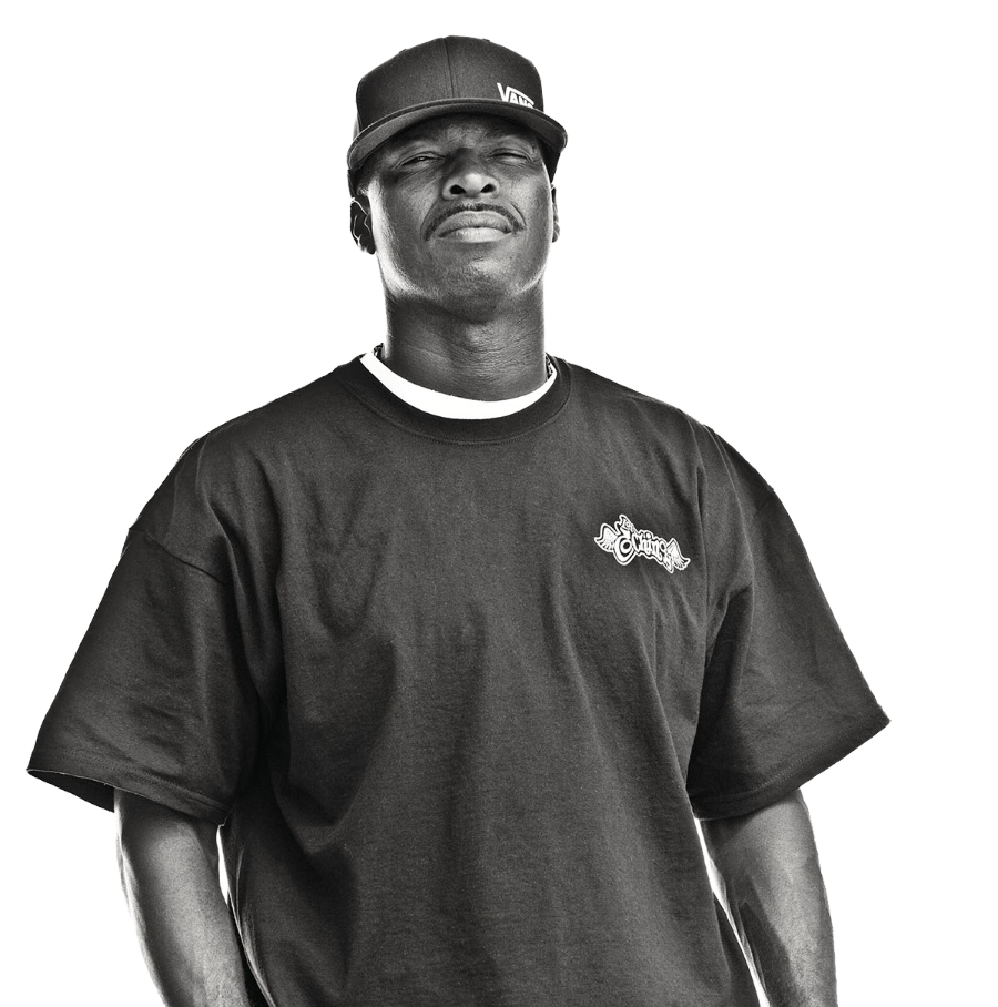 A man in a black Vans hat and black shirt poses for the camera