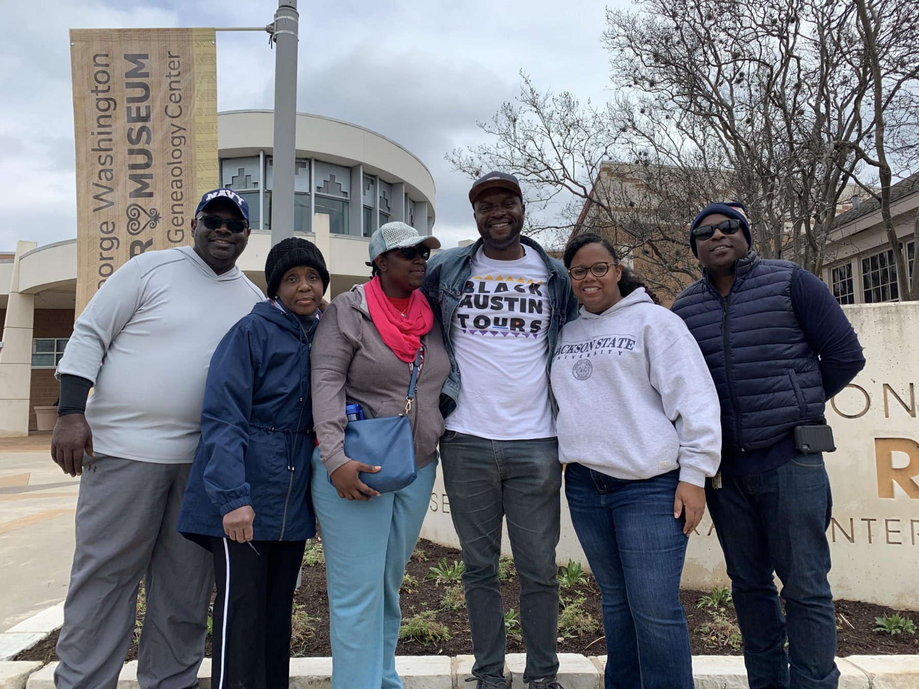 black austin tour group outside the George Washington Carver Museum in austin texas