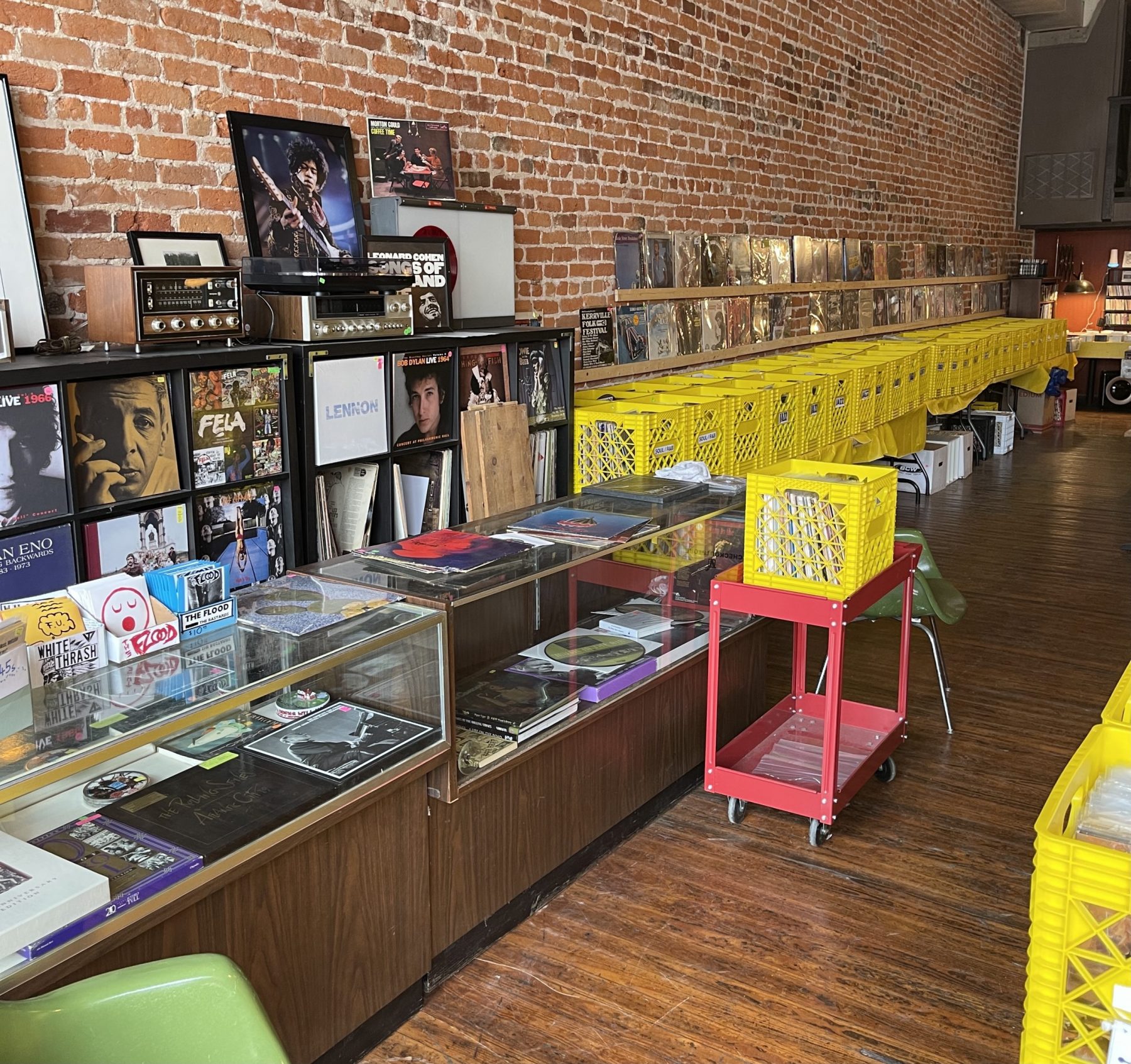 Color photo of records and yellow crates