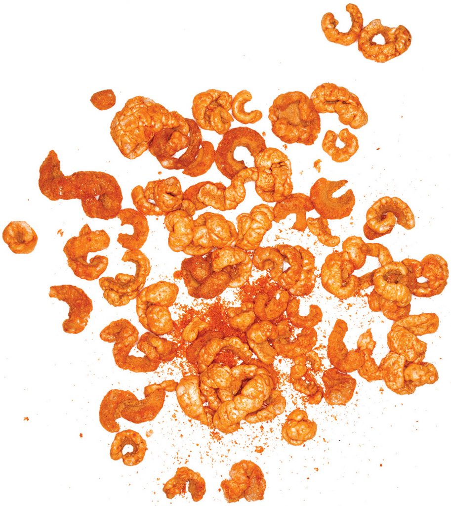 A scattering of bright orange and yellow cracklins