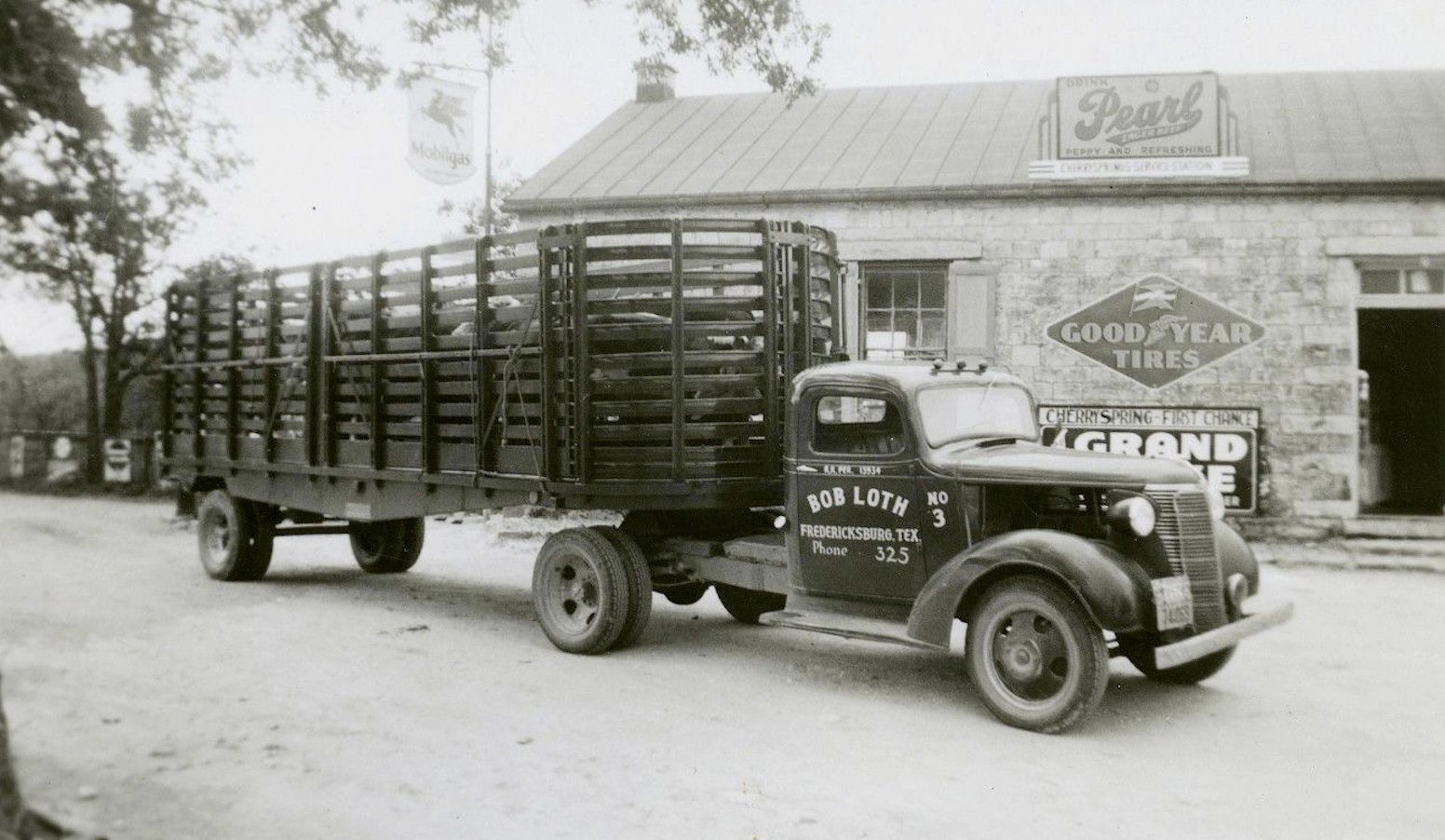 A truck full of tires reading 'Bob Loth' on the side