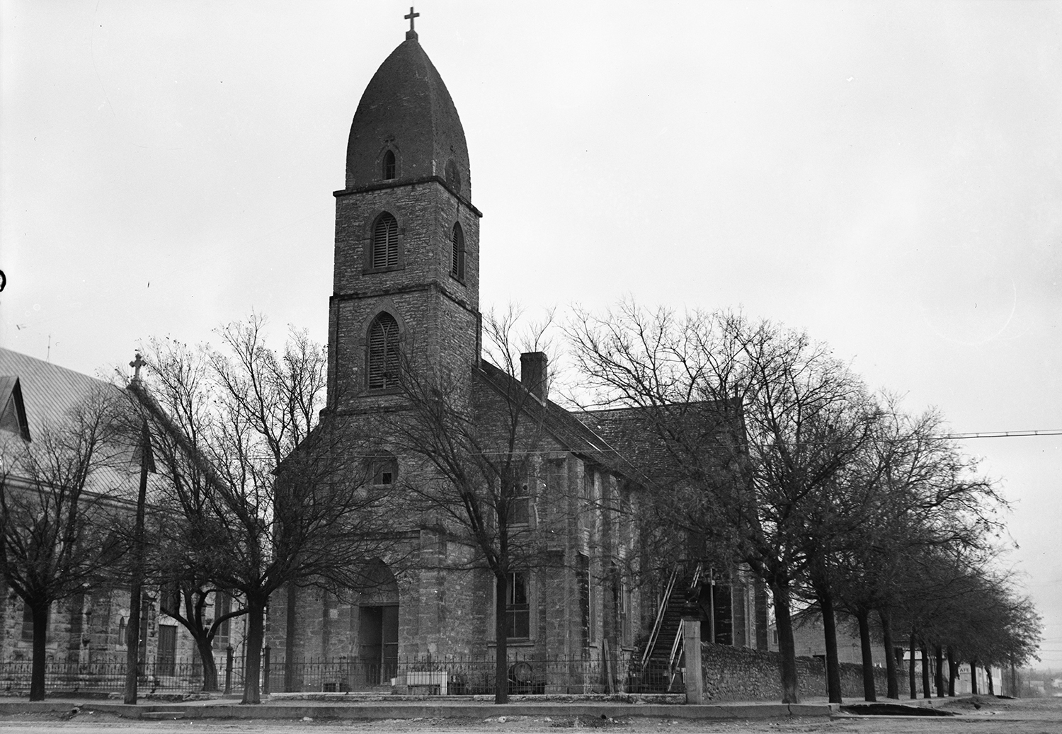 The outside of a tall brick church