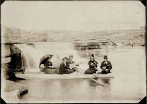 Vintage photo of people canoeing on the Colorado river