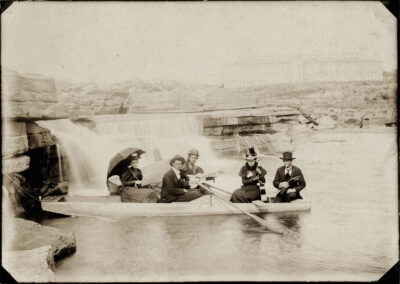 Boaters Pose in Front of the Marble Falls Around 1900