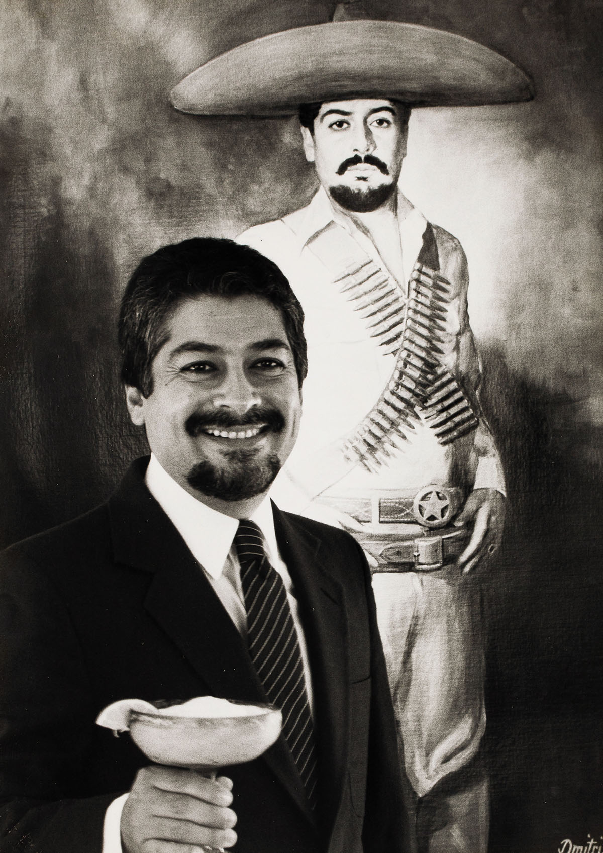 Mariano Martinez holding a frozen margarita