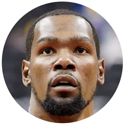 A picture of Kevin Durant looking at a basketball hoop
