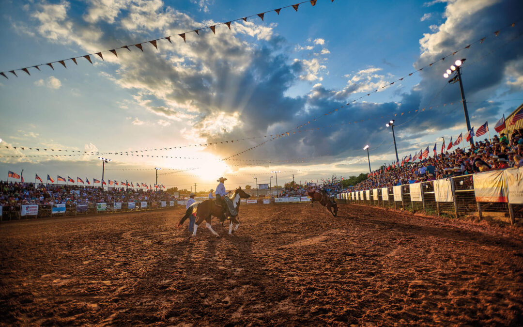A Bronc Rider Beats the Buzzer at the Jim Bowie Days Rodeo in North Texas
