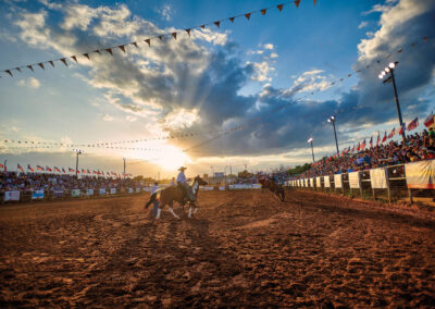 A Bronc Rider Beats the Buzzer at the Jim Bowie Days Rodeo in North Texas